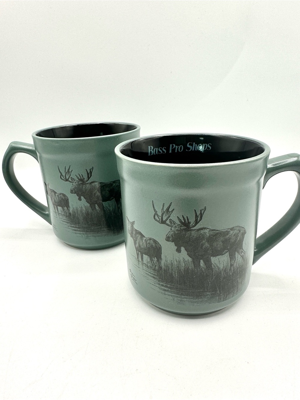2 Bass Pro Shops, Large Mugs with Moose on the Outside. By Abraham Hunter